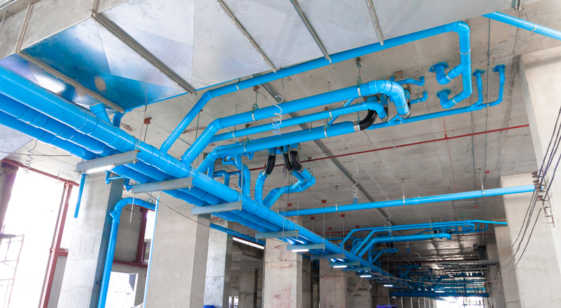 Various systems within the structure of the building under construction.
